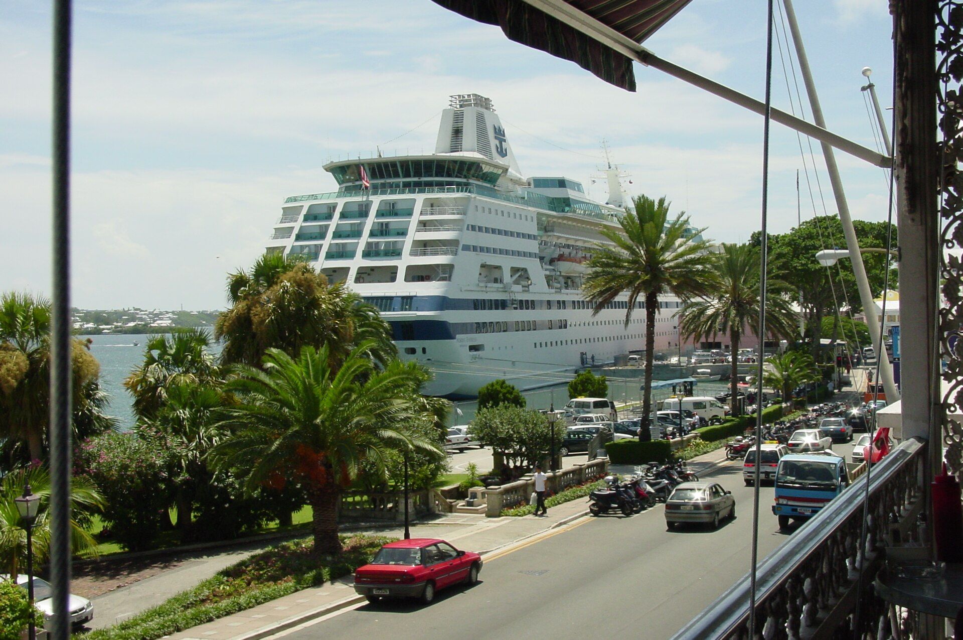 A cruise ship docked behind Front Street in Hamilton, Bermuda
